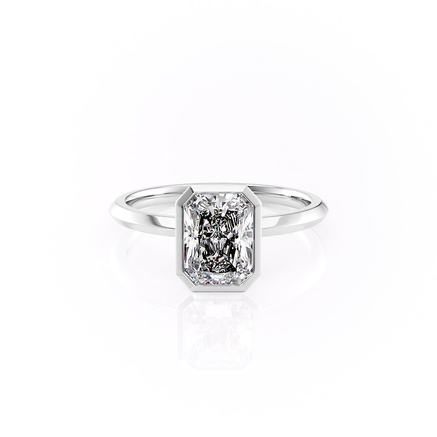 The Razor Bezel Kamellie Set With A 3 Carat Radiant Moissanite
