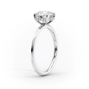 The Razor Kamellie Set With A 2.5 Carat Pear Lab Diamond