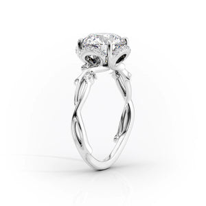The Halo Twig Set With A 2.5 Carat Oval Moissanite