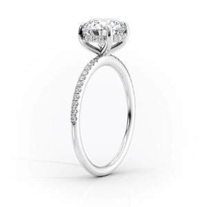 The Pave Kamellie Set With A 1 Carat Radiant Moissanite
