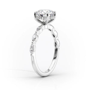 The Lucia Set With A 1 Carat Pear Moissanite